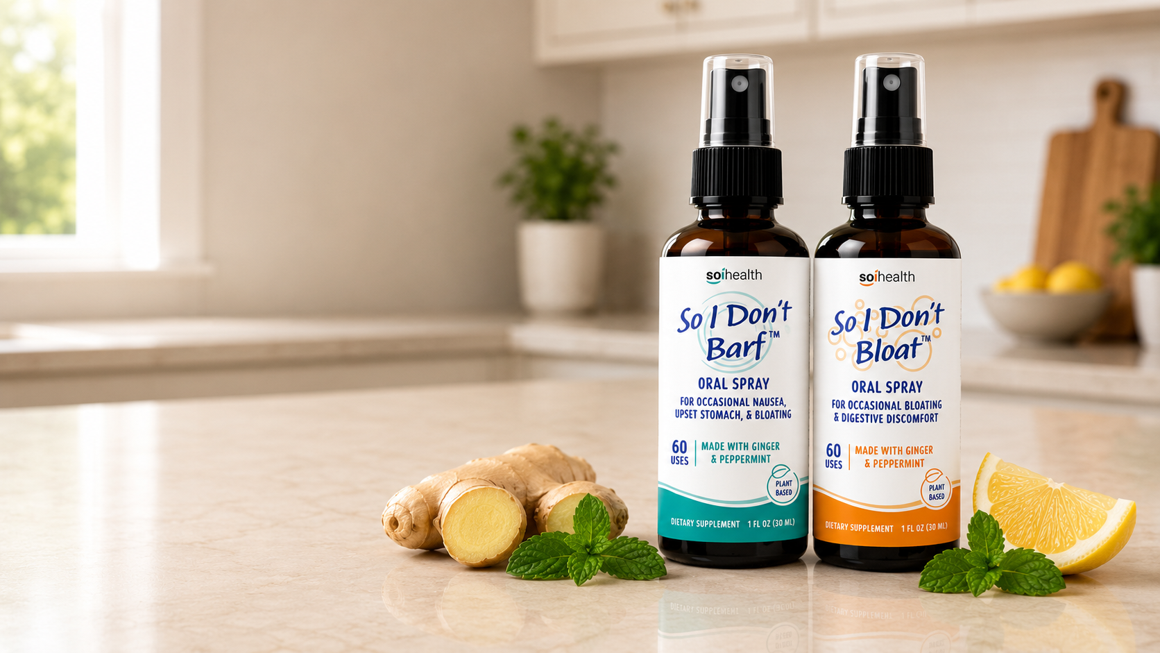 Two Soi Health oral spray bottles, So I Don't Barf™ and So I Don't Bloat™, displayed on a kitchen countertop with fresh ginger, peppermint, and lemon.